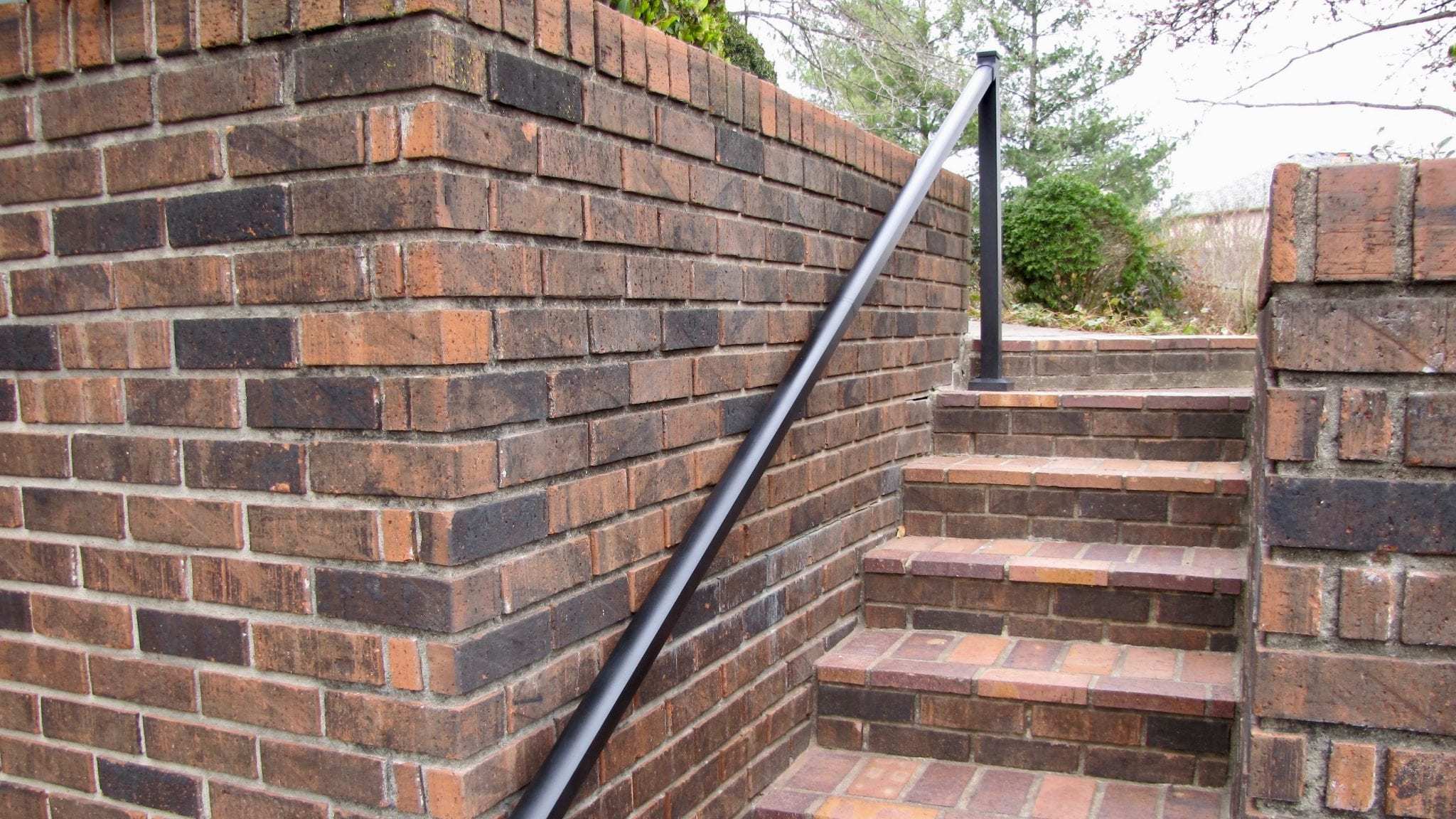 Aluminum Handrail Direct AHR handrail on brick stairs