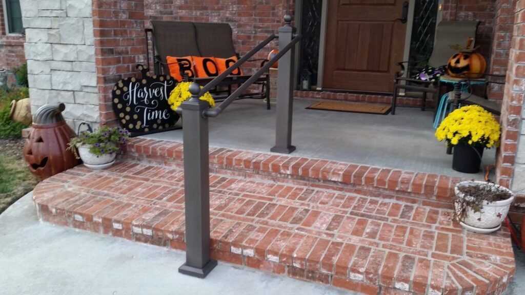 handrail (from Aluminum Handrail Direct) on steps leading up to front door