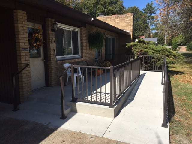 Aluminum Handrail Direct handrail along ramp leading to front doorway