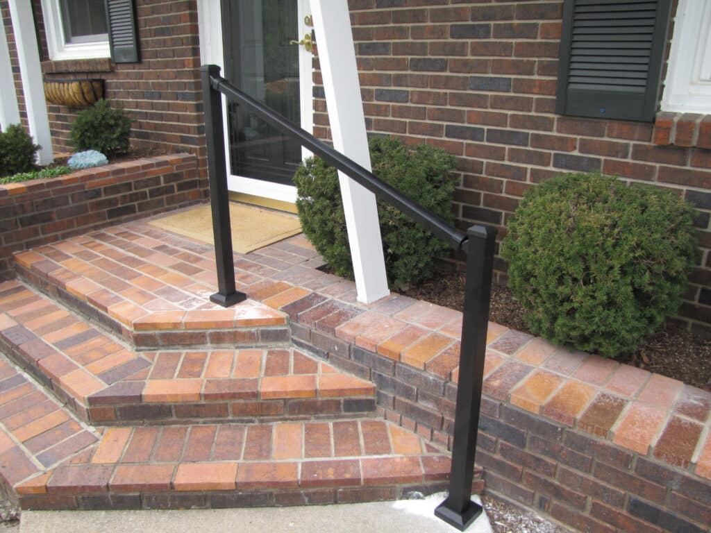 Aluminum Handrail Direct handrail positioned on front steps of house