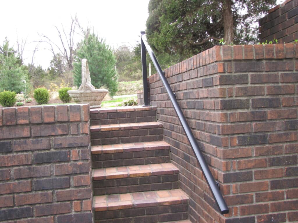 AHD aluminum railing on the side of brick steps
