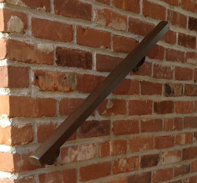 Aluminum Handrail Direct railing installed on brick wall