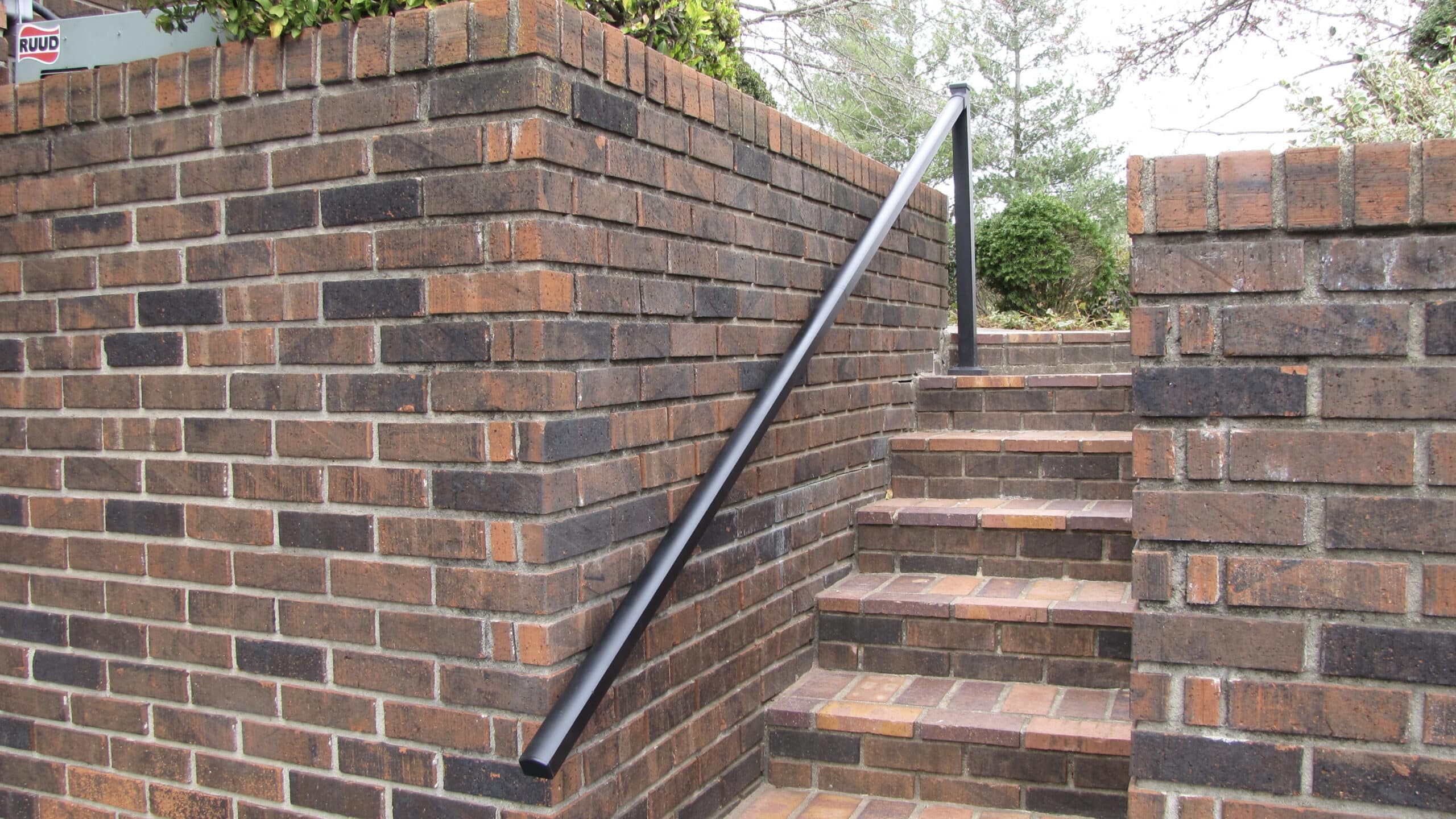 handrail on brick steps